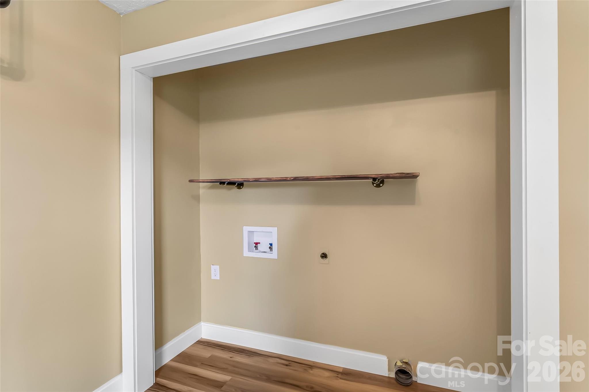 825 South Creek Road Nebo, NC 28761 - Photo 26 of 34 a view of walk in closet with empty racks
