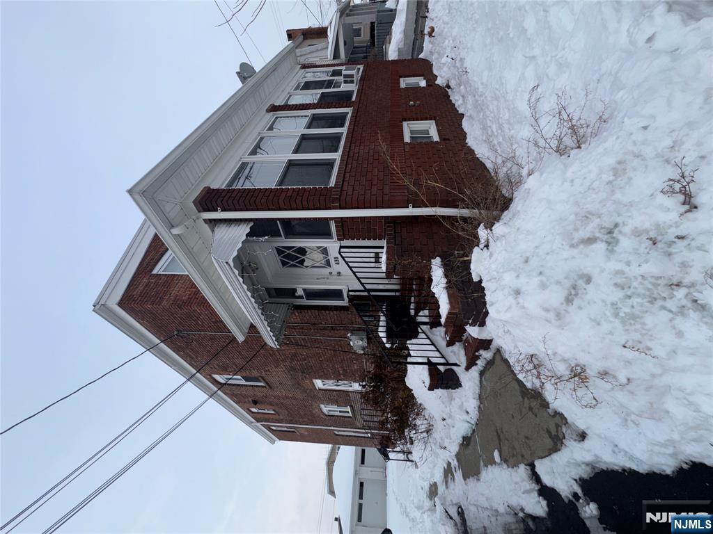 438 4th Street, Unit 1 Carlstadt, NJ 07072 - Photo 1 of 11 a view of a house with a yard