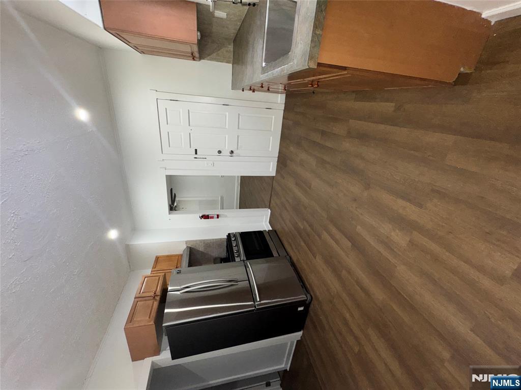 438 4th Street, Unit 1 Carlstadt, NJ 07072 - Photo 4 of 11 a view of kitchen and a sink