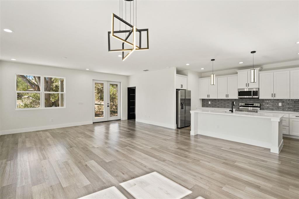 2956 West Higgins Place Dunnellon, FL 34433 - Photo 20 of 52 a view of kitchen with granite countertop cabinets and refrigerator