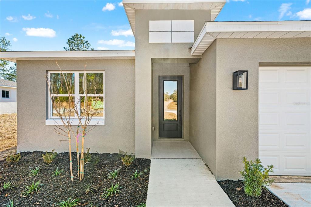 2956 West Higgins Place Dunnellon, FL 34433 - Photo 2 of 52 a front view of a house