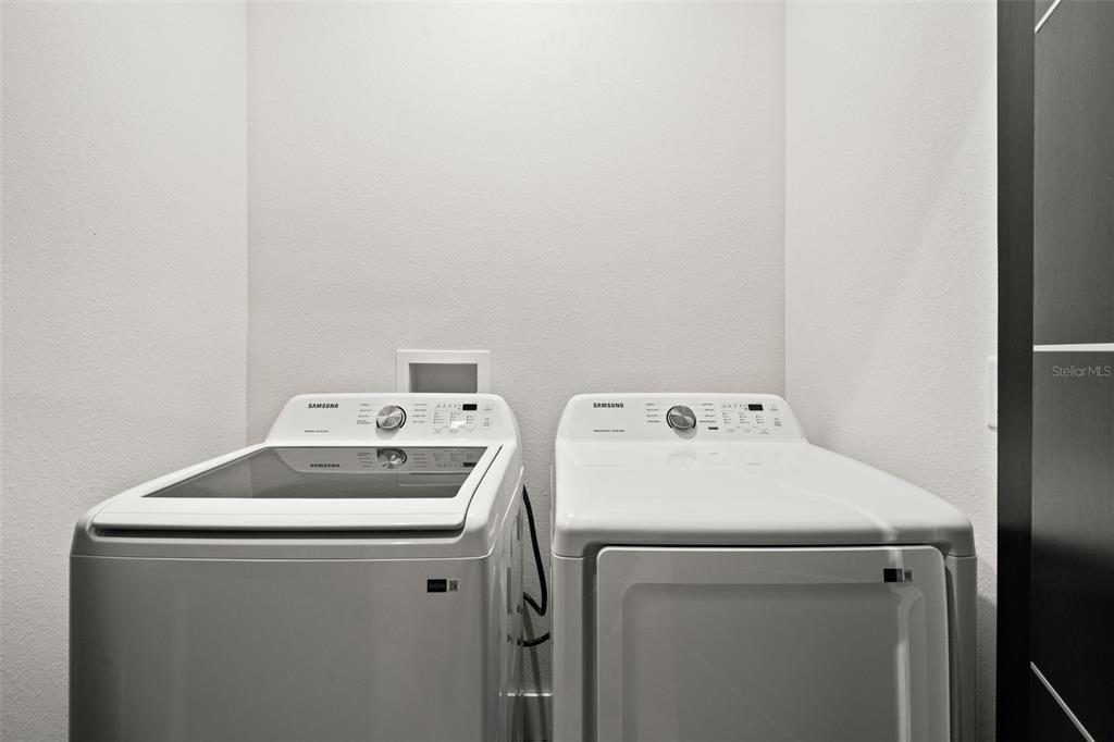 2956 West Higgins Place Dunnellon, FL 34433 - Photo 43 of 52 a utility room with dryer and washer
