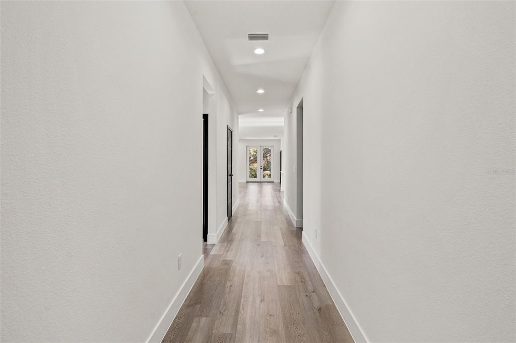 2956 West Higgins Place Dunnellon, FL 34433 - Photo 5 of 52 a view of hallway with wooden floor