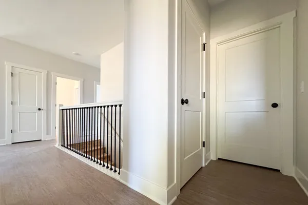 a view of a hallway with closet area