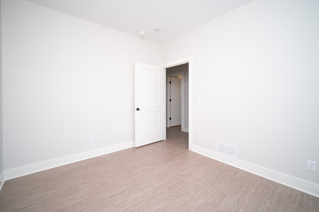 609 Anjali Court, Unit L Sycamore, IL 60178 - Photo 8 of 20 a view of an empty room