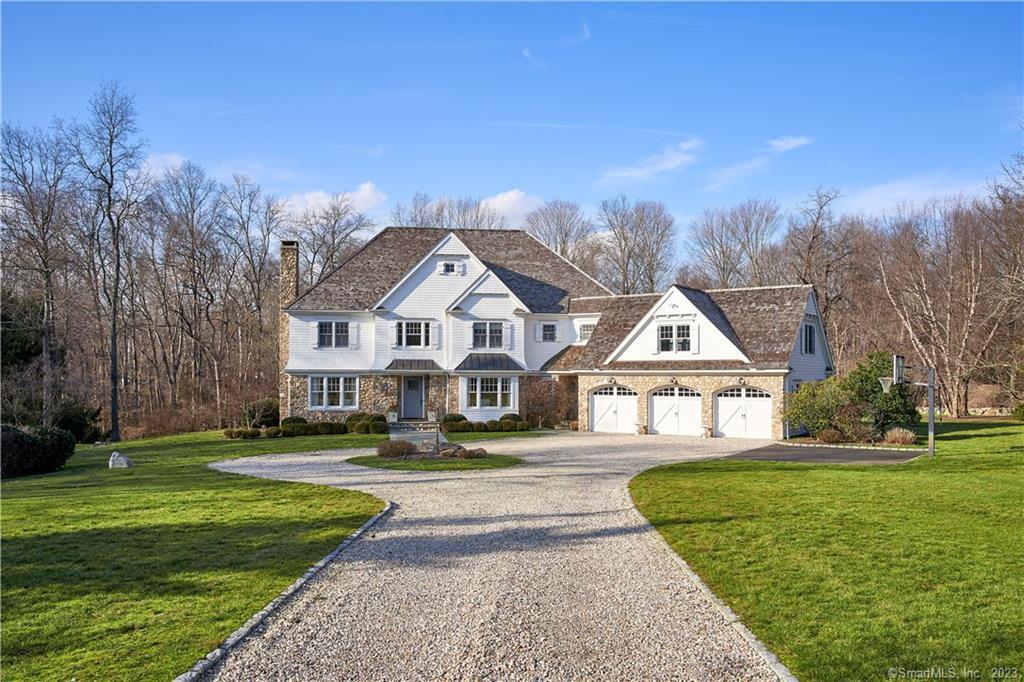 85 Chestnut Hill Road Wilton, CT 06897 - Photo 1 of 1 a front view of a house with a yard