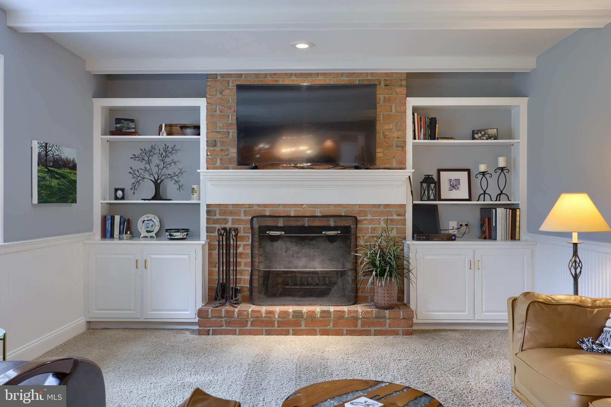 5 Clover Court Lititz, PA 17543 - Photo 18 of 52 COZY FIREPLACE SURROUNDED BY BUILT IN CABINETS