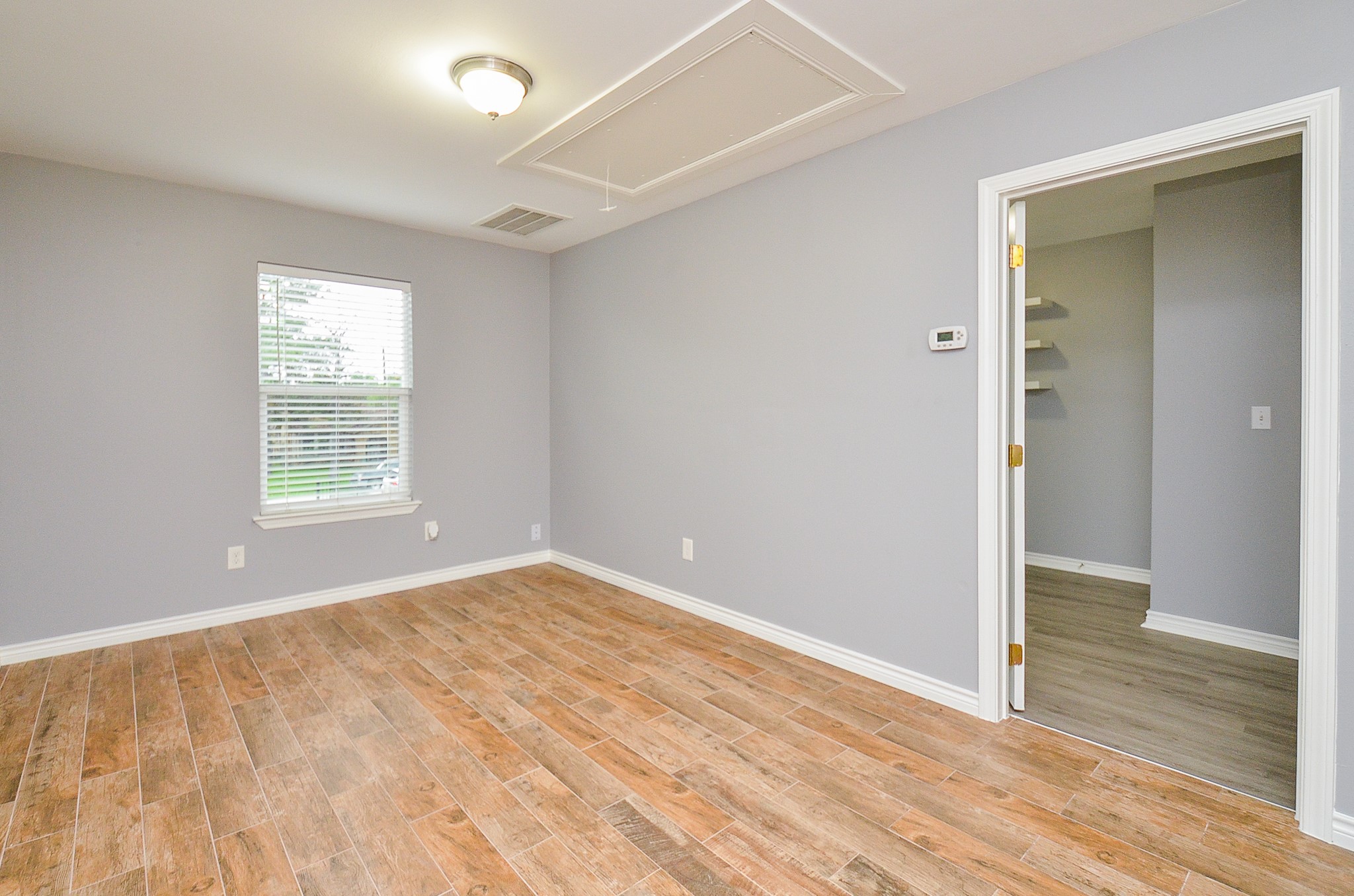 303 Vincent Street, Unit A Houston, TX 77009 - Photo 10 of 15 Living space with door leading bedroom