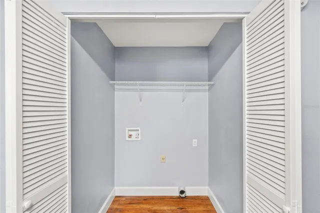 a view of a room with window and a bathroom