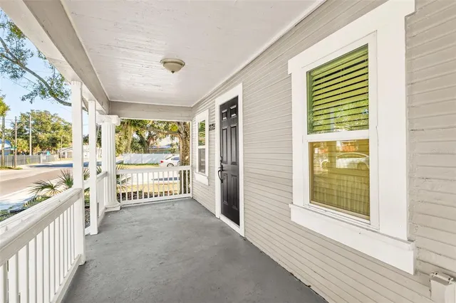 a view of a hallway with windows