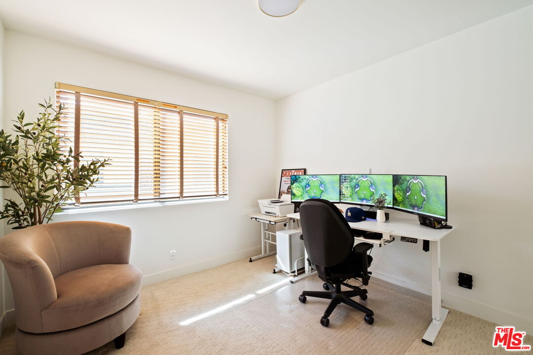 207 South Oakland Avenue, Unit A Pasadena, CA 91101 - Photo 33 of 41 a view of workspace with furniture and a window