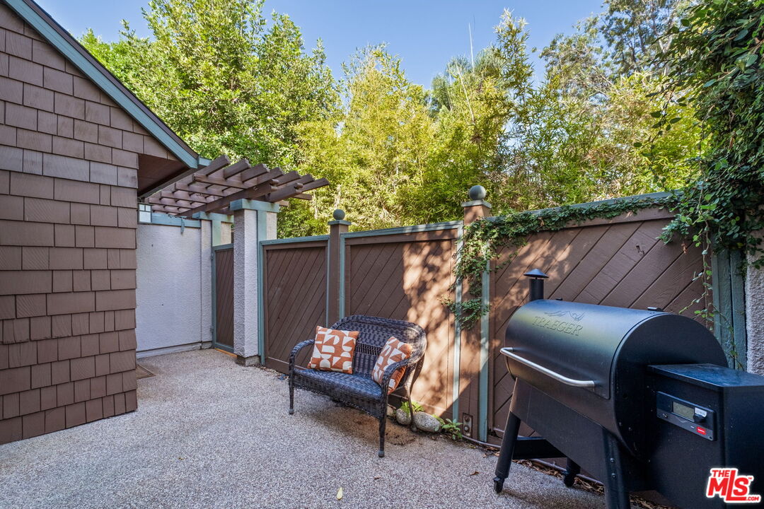 207 South Oakland Avenue, Unit A Pasadena, CA 91101 - Photo 6 of 41 a view of backyard with outdoor seating and trees