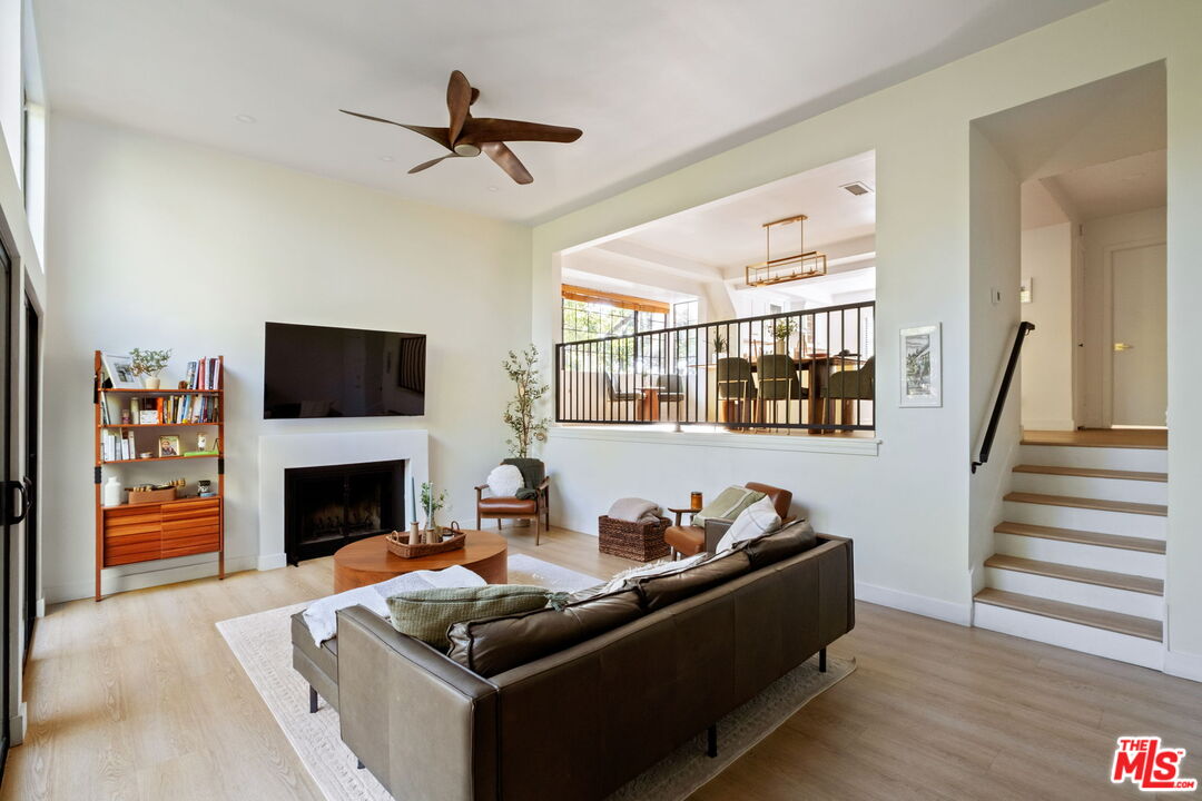 207 South Oakland Avenue, Unit A Pasadena, CA 91101 - Photo 8 of 41 a living room with furniture fireplace and flat screen tv