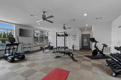 a view of a room with gym equipment