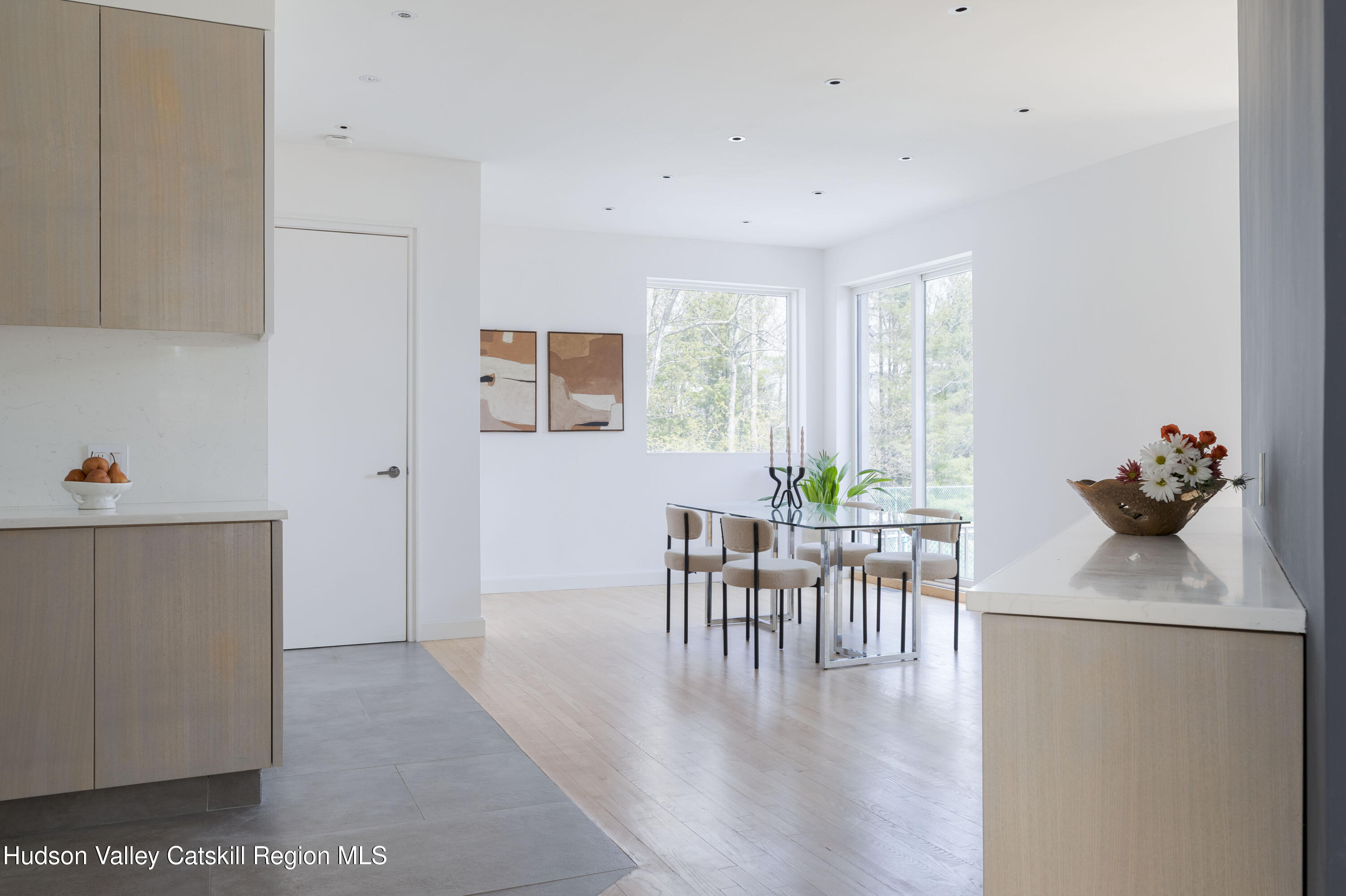 12 Jacob Strasse Road Windham, NY 12496 - Photo 13 of 54 a dining room with furniture potted plants and wooden floor