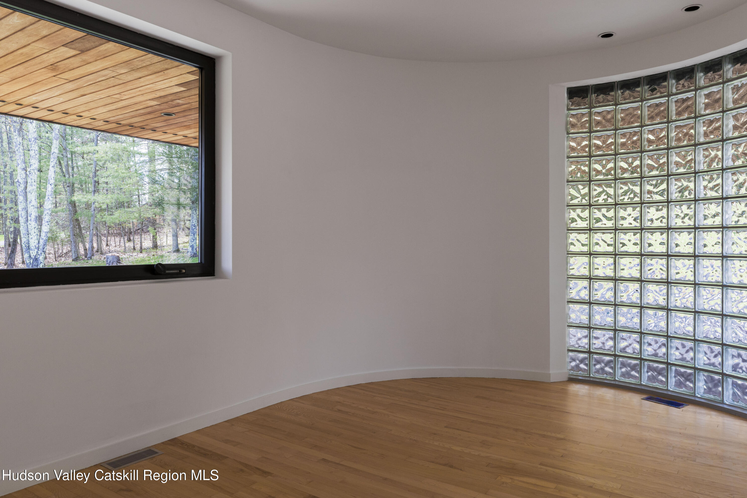 12 Jacob Strasse Road Windham, NY 12496 - Photo 19 of 54 a view of an empty room with wooden floor and a window