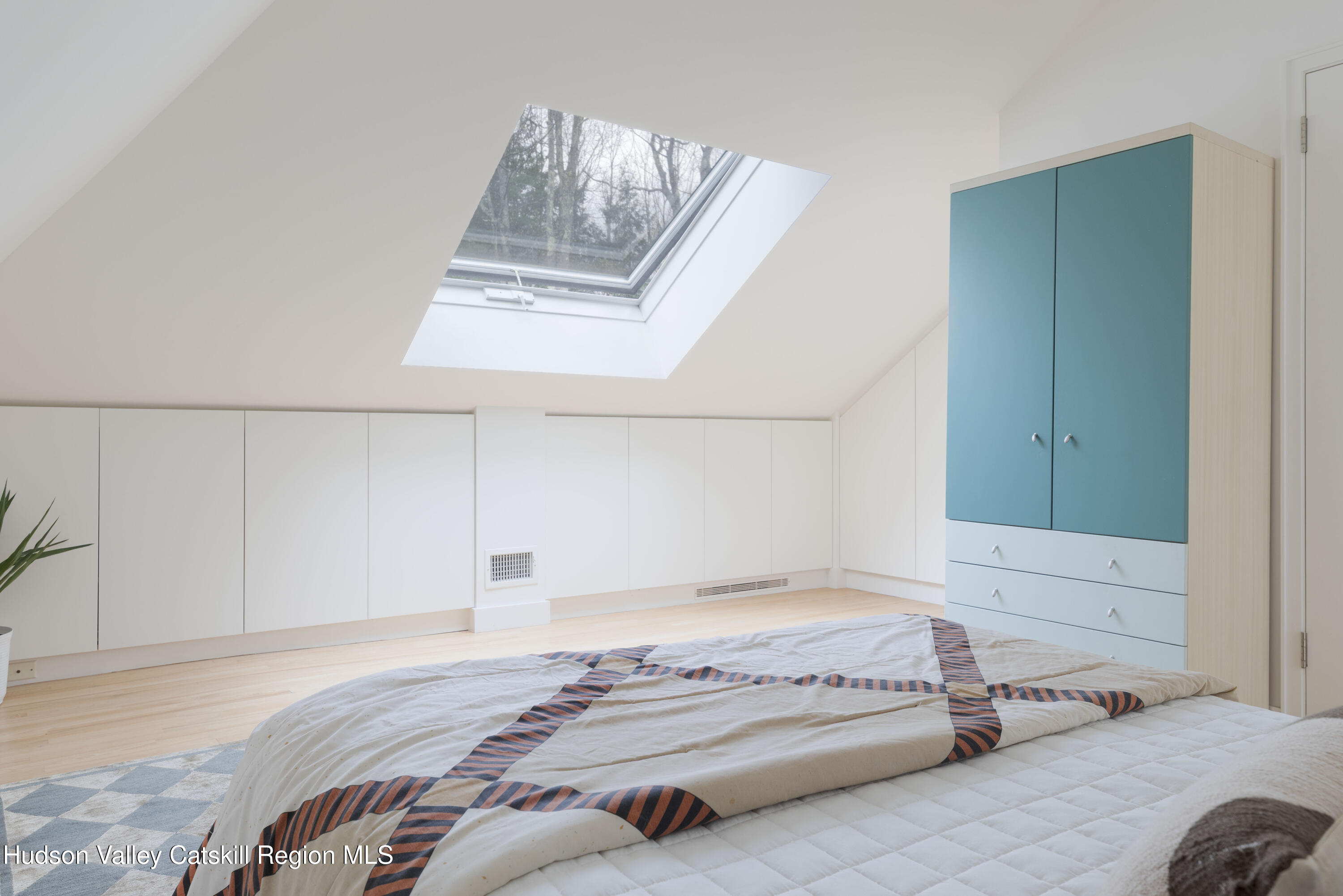 12 Jacob Strasse Road Windham, NY 12496 - Photo 25 of 54 a bedroom with a bed and a painting on the wall