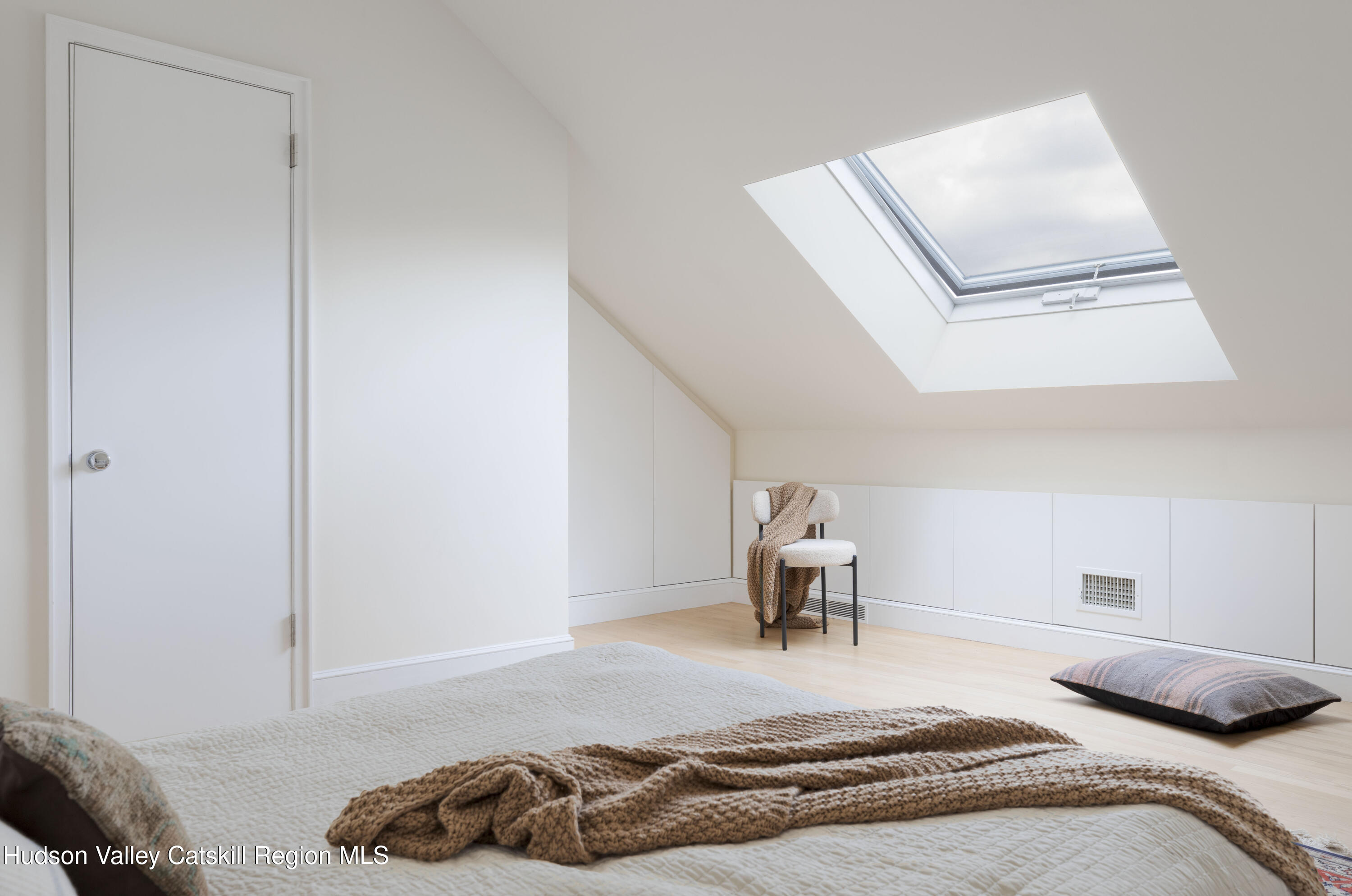 12 Jacob Strasse Road Windham, NY 12496 - Photo 27 of 54 a bedroom with a bed and chair