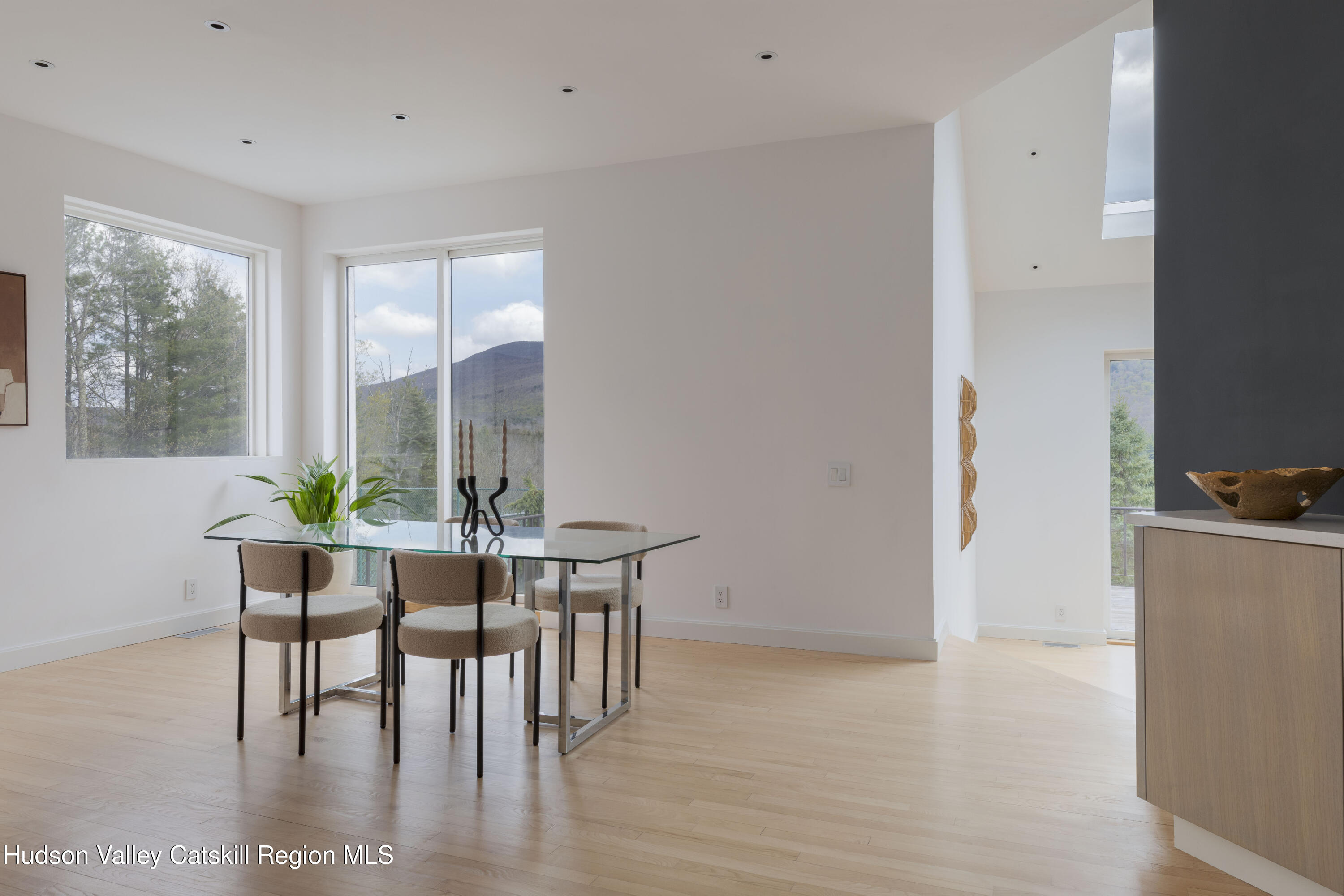 12 Jacob Strasse Road Windham, NY 12496 - Photo 3 of 54 a view of a dining room with furniture window and wooden floor