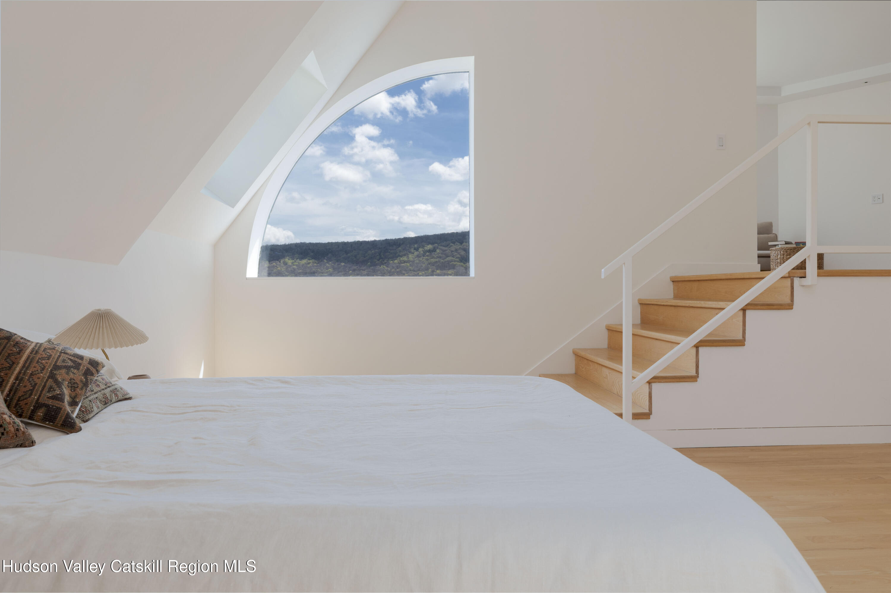 12 Jacob Strasse Road Windham, NY 12496 - Photo 33 of 54 a bedroom with a bed and wooden floor