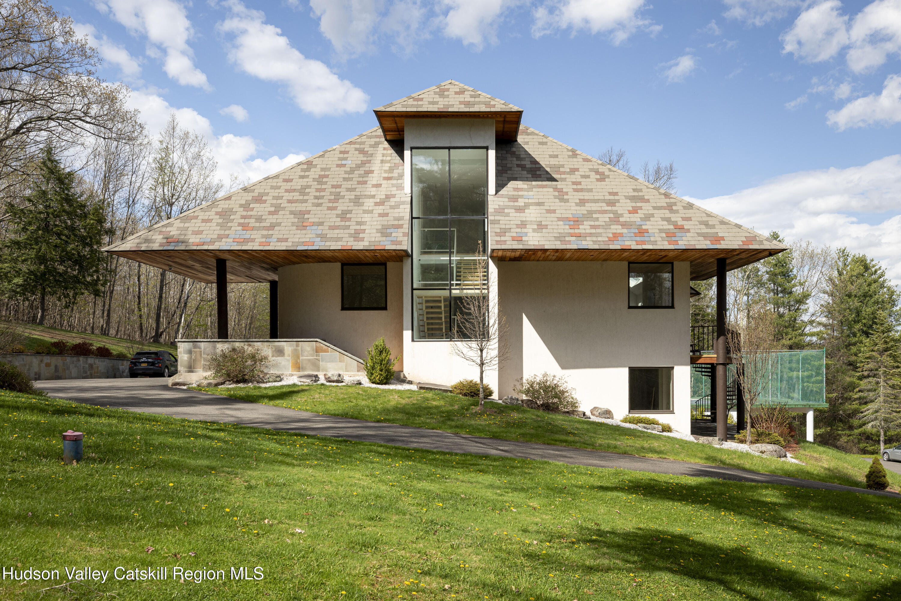 12 Jacob Strasse Road Windham, NY 12496 - Photo 48 of 54 a front view of a house with a yard table and chairs