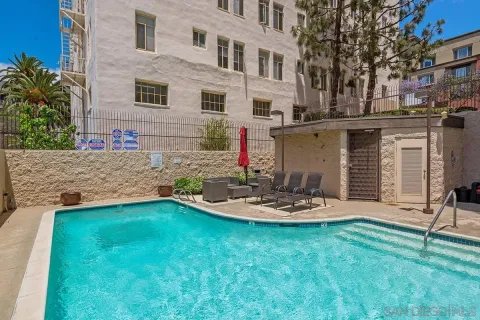 a backyard of a house with seating space