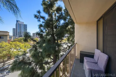 a balcony with chairs