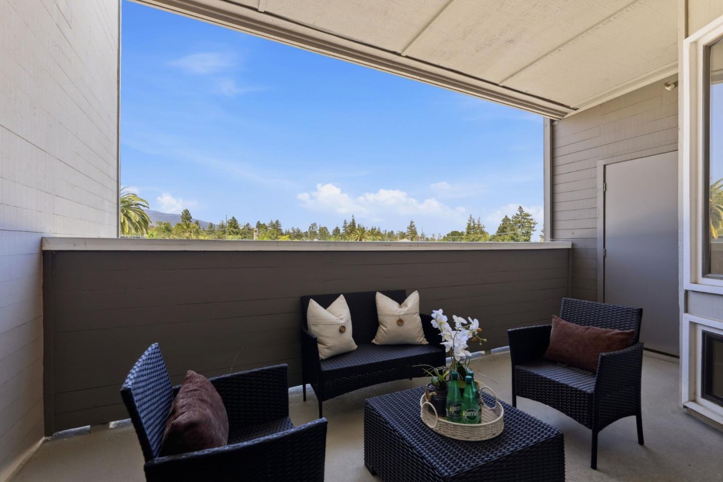 22330 Homestead Road, Unit 226 Cupertino, CA 95014 - Photo 18 of 38 a roof deck with couches and potted plants