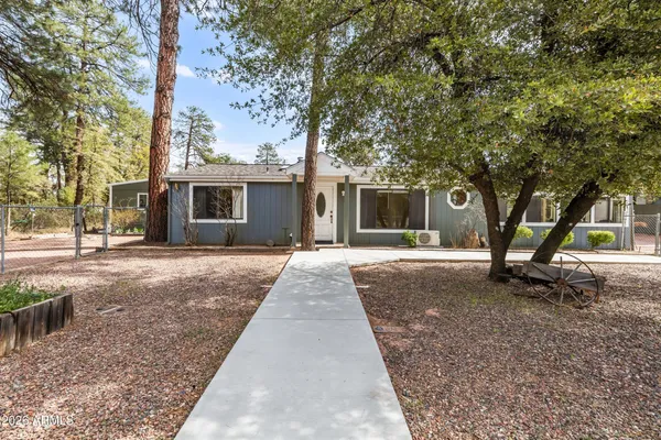a view of yard with patio