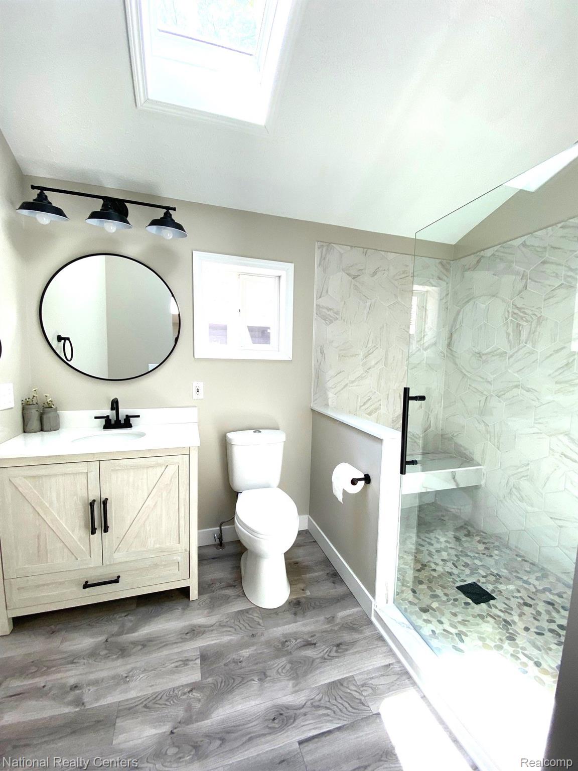 4823 Kokosing Road Hale, MI 48739 - Photo 40 of 54 Master bath w/large ceramic shower, sky light