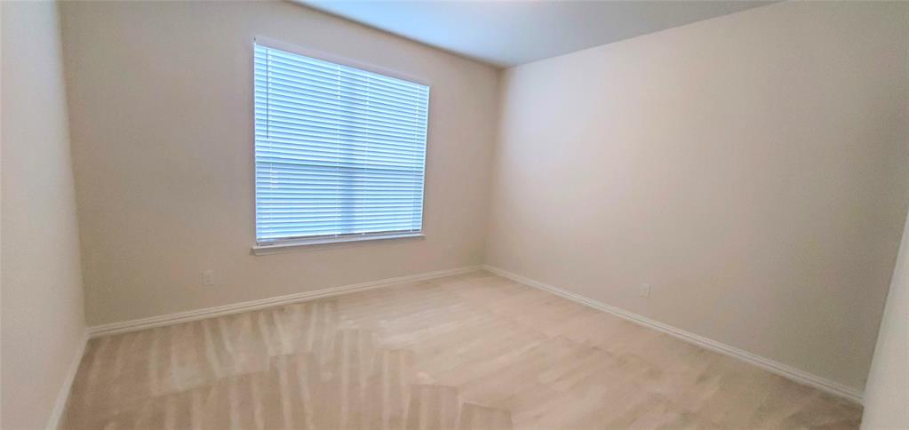 2016 Robert Street Anna, TX 75409 - Photo 4 of 8 a view of an empty room with a window