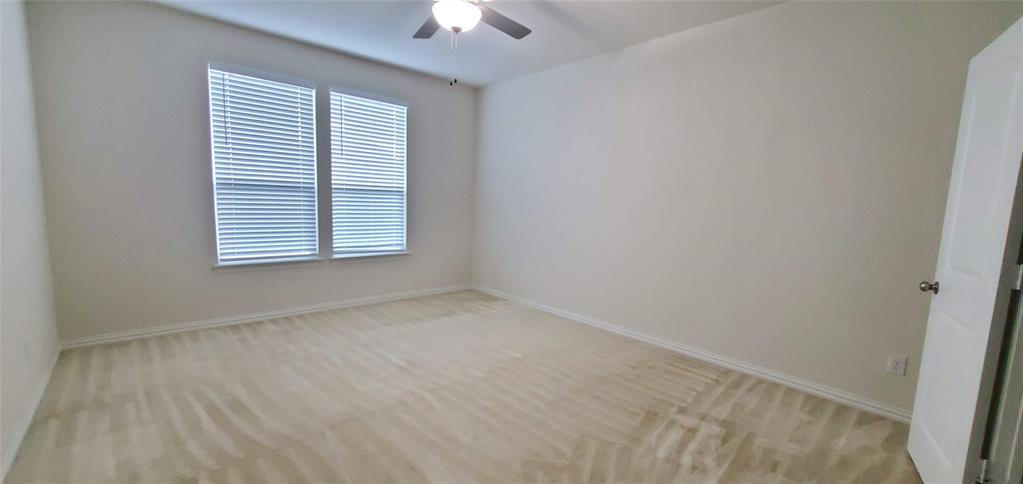 2016 Robert Street Anna, TX 75409 - Photo 6 of 8 an empty room with a window