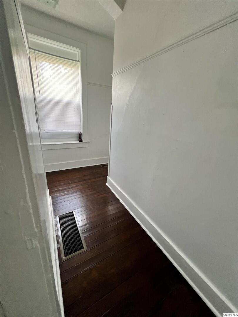 801 Monroe Street Quincy, IL 62301 - Photo 28 of 34 a view of wooden floor in an empty room