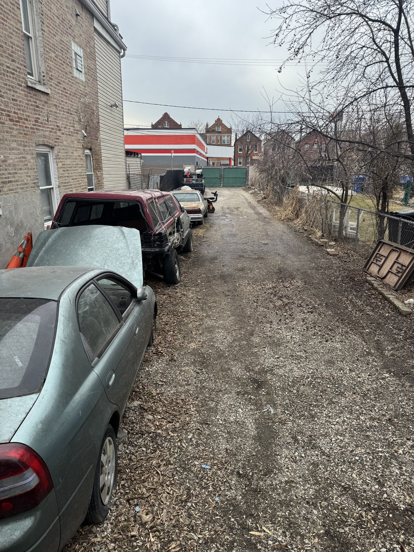 2640 South Troy Street Chicago, IL 60623 - Photo 4 of 5 a front view of a house with outdoor seating