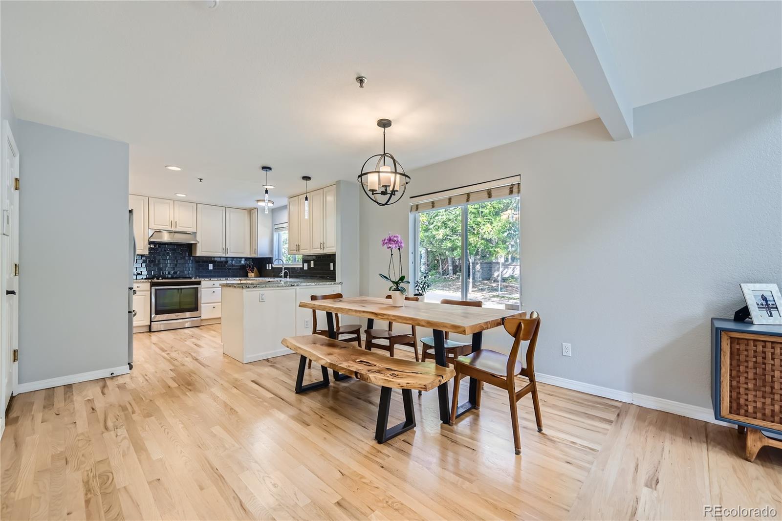4766 Franklin Drive Boulder, CO 80301 - Photo 5 of 26 a view of a dining room with furniture window and wooden floor