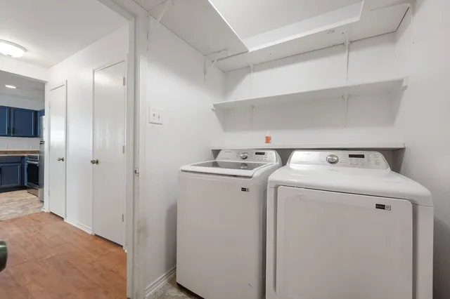a utility room with dryer and washer