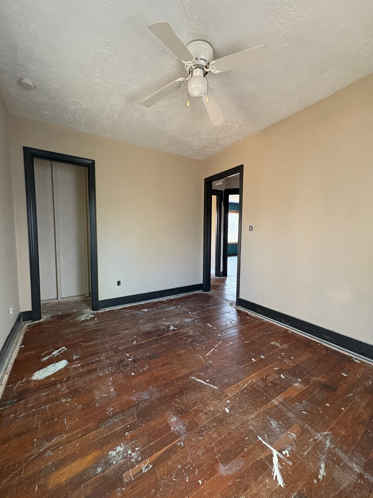 62 Pleasant Hill Road Murphy, NC 28906 - Photo 20 of 28 a view of an empty room with window and chandelier fan