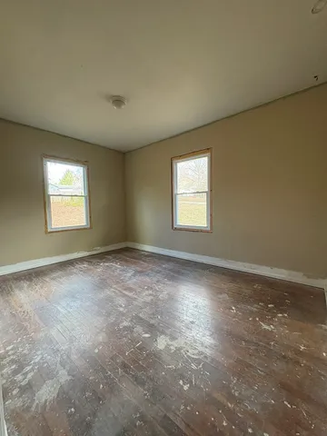 an empty room with windows