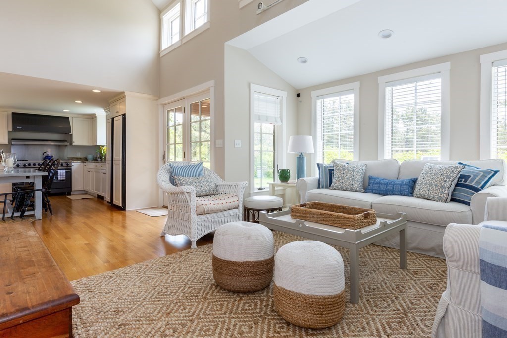 12 A Pond View Drive, Unit COTTAGE Nantucket, MA 02554 - Photo 2 of 14 a living room with furniture and a large window