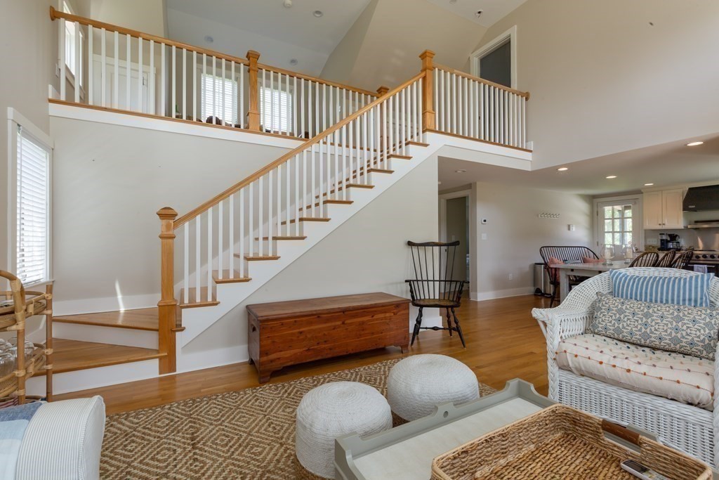 12 A Pond View Drive, Unit COTTAGE Nantucket, MA 02554 - Photo 6 of 14 a living room with furniture or stairs and a rug