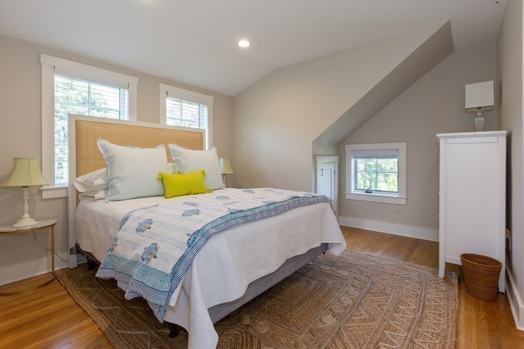 12 A Pond View Drive, Unit COTTAGE Nantucket, MA 02554 - Photo 10 of 14 a bedroom with a bed and window