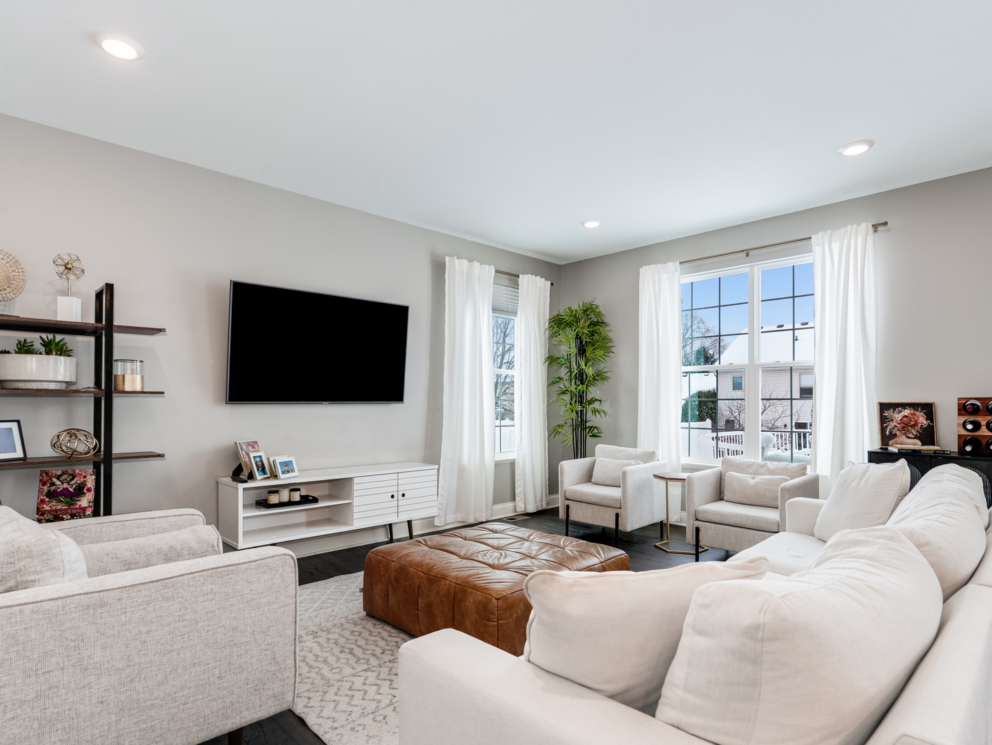 707 Long Ridge Trail Minooka, IL 60447 - Photo 14 of 39 a living room with furniture and a flat screen tv