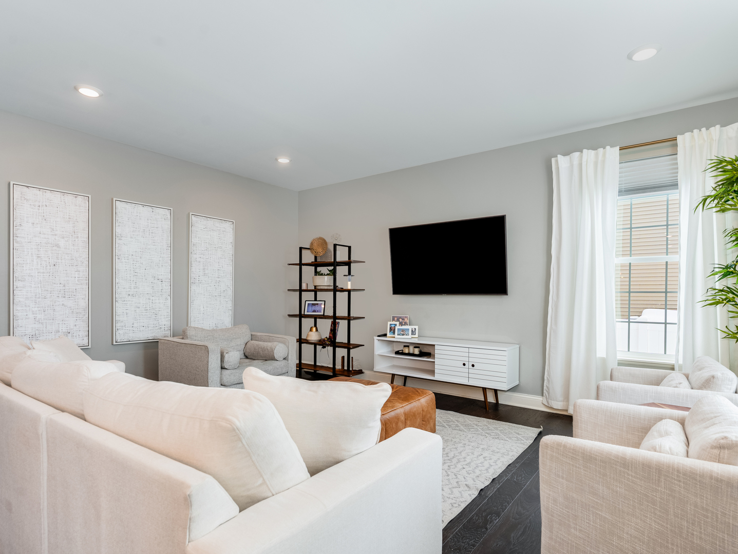 707 Long Ridge Trail Minooka, IL 60447 - Photo 15 of 39 a living room with furniture and a flat screen tv