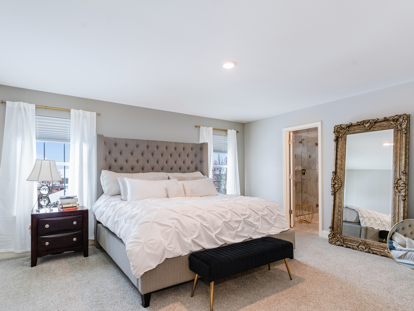 707 Long Ridge Trail Minooka, IL 60447 - Photo 22 of 39 a bedroom with a bed and a lamp