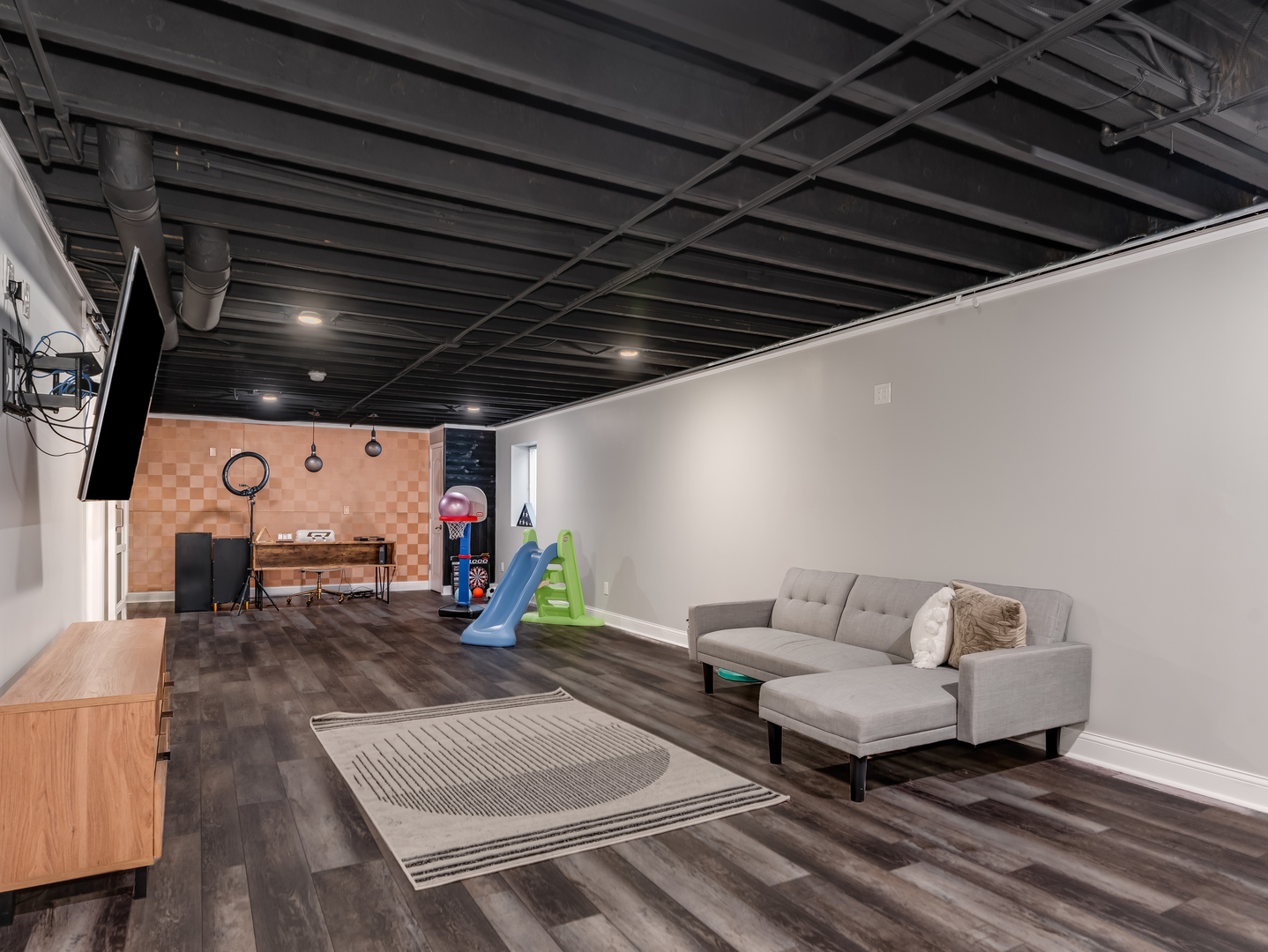 707 Long Ridge Trail Minooka, IL 60447 - Photo 29 of 39 a living room with furniture and a flat screen tv