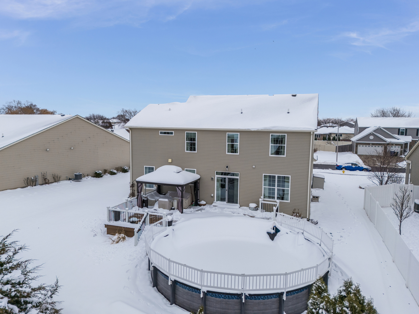 707 Long Ridge Trail Minooka, IL 60447 - Photo 38 of 39 a view of a kitchen with a sink and living room