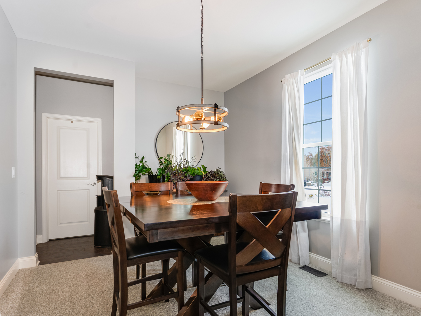 707 Long Ridge Trail Minooka, IL 60447 - Photo 6 of 39 a dining room with furniture window and wooden floor