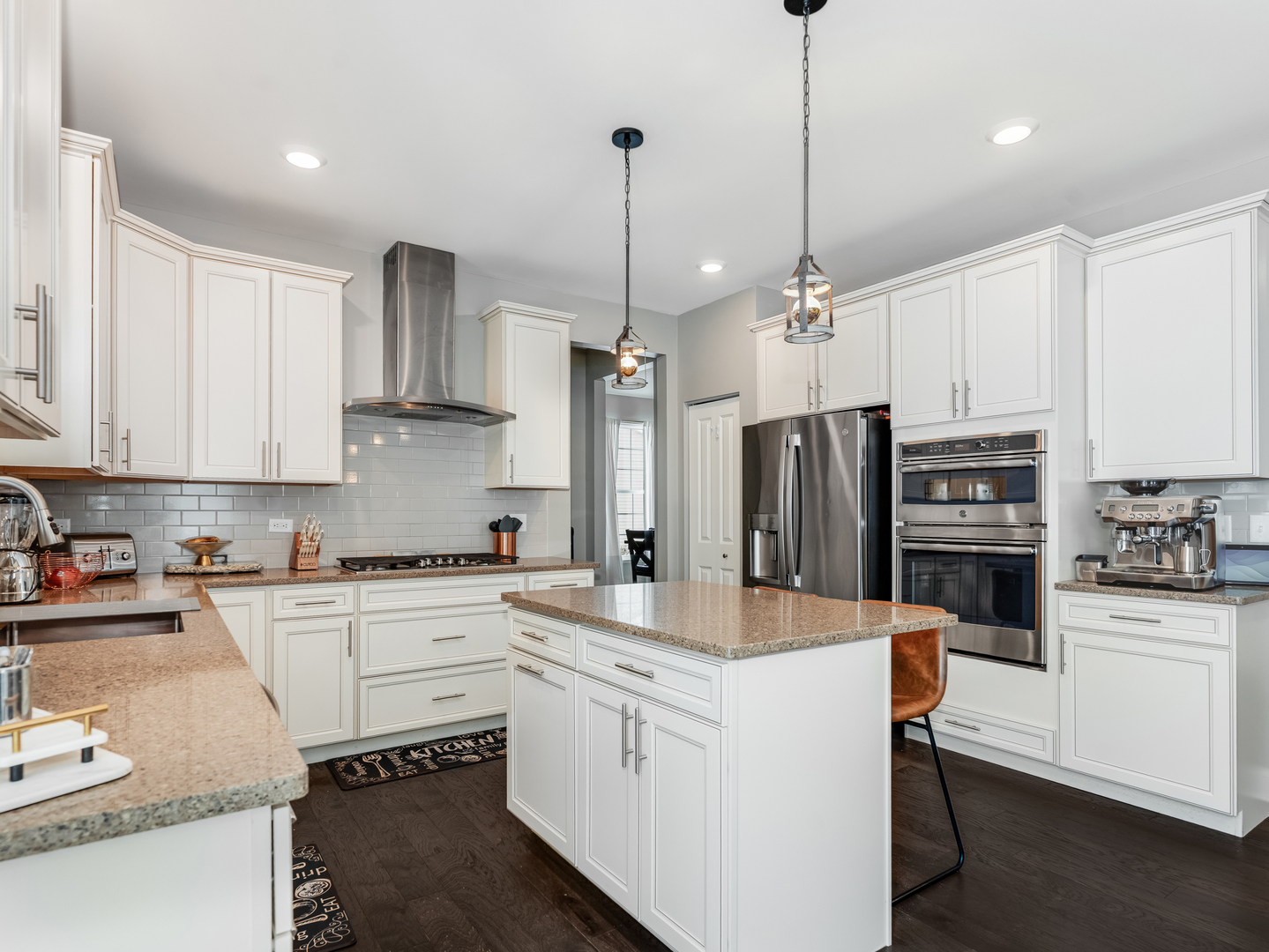 707 Long Ridge Trail Minooka, IL 60447 - Photo 10 of 39 a kitchen that has a lot of cabinets a sink and appliances