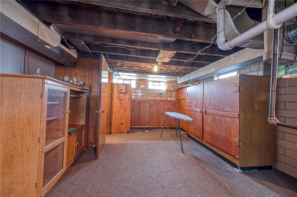 699 Kaye Avenue Monaca, PA 15061 - Photo 28 of 43 a view of an empty room with wooden walls