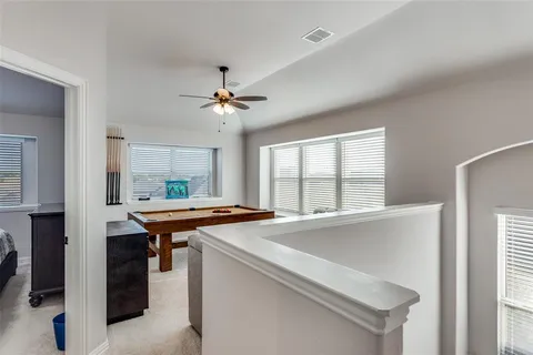a view of a kitchen with a sink and a window